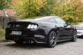 Rear view of black ford mustang 500 GT cars parked in the street Royalty Free Stock Photo