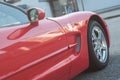 front view of red Chevrolet Corvette parked in the street Royalty Free Stock Photo