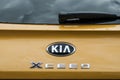 Kia X ceed crossover rear view in retailer showroom