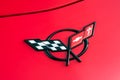 Logo on red Chevrolet Corvette front parked in the street Royalty Free Stock Photo