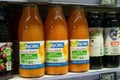 natural juice of organic fruits in glass bottles by the famous brand Bjorg at the supermarket