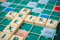 Plastic letters on Scrabble board game forming the word : Brexit