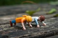 Playmobil figurines making sport in outdoor