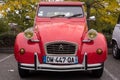 Front view of red 2CV6 parked in the street Royalty Free Stock Photo