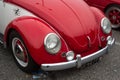 Front view of red Volkswagen beetle car parked in the street Royalty Free Stock Photo