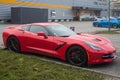 Profile view of red chevrolet corvette parked in the street Royalty Free Stock Photo