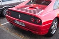 Rear view of red Ferrari F355 berlinetta parked in the street