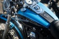 Closeup of blue and black  tank on Harley Davidson motorbike parked in the street Royalty Free Stock Photo