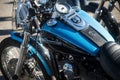 Closeup of blue and black  tank on Harley Davidson motorbike parked in the street Royalty Free Stock Photo