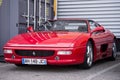 Front view of red ferrari F355 parked in the street Royalty Free Stock Photo