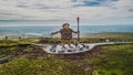 Aerial mountain top views of Mullaghcarn Giant sculpture in Ireland