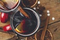 Mulled wine background. A hot winter Christmas drink based on red wine, spices and citrus fruits Royalty Free Stock Photo