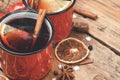 Mulled wine background. A hot winter Christmas drink based on red wine, spices and citrus fruits Royalty Free Stock Photo