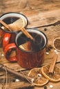 Mulled wine background. A hot winter Christmas drink based on red wine, spices and citrus fruits Royalty Free Stock Photo