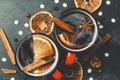 Mulled wine background. A hot winter Christmas drink based on red wine, spices and citrus fruits Royalty Free Stock Photo