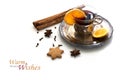 Mulled wine, Christmas punch with orange slices and spices isolated with shadows on white Royalty Free Stock Photo