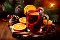 Mulled wine with cinnamon and Christmas decorations