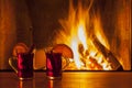 Mulled wine at cozy fireplace firelight only Royalty Free Stock Photo