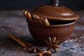 Mulled wine flavoring: cinnamon, star anise in a brown bowl