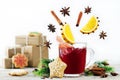 Mulled wine with flying ingredients to prepare it Royalty Free Stock Photo