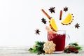 Mulled wine with flying ingredients to prepare it Royalty Free Stock Photo
