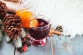 Mulled wine hot drink with citrus, apple and spices in a drink glass Royalty Free Stock Photo