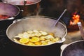 Mulled wine with oranges in large vats on Christmas market. New year and Christmas celebration concept, traditional drink Royalty Free Stock Photo