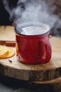 Mulled wine in a red ceramic mug Royalty Free Stock Photo