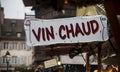 Mulled wine sign in french at the christmas market, traduction in english of vin chaud in french