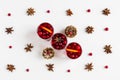 Mulled wine in small glasses with cranberries, anise and oranges. White background, top view Royalty Free Stock Photo