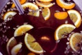 Mulled wine with soup ladle, close up