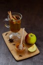 Apple cider with fresh apples and honey. Hot fruit tea with spices Royalty Free Stock Photo