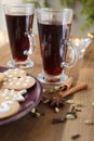 Mulled wine with spices and gingerbread on a Christmas table Royalty Free Stock Photo