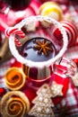 Mulled wine with spices and gingerbread cookies.