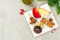 Mulled wine with spices in a pot with traditional Christmas decor. Hot beverage, festive background Royalty Free Stock Photo