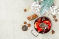 Mulled wine with spices in a pot with traditional Christmas decor. Hot beverage, festive background Royalty Free Stock Photo