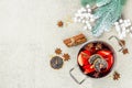 Mulled wine with spices in a pot with traditional Christmas decor. Hot beverage, festive background Royalty Free Stock Photo