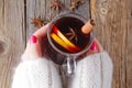 Mulled wine and spices on weathered wooden table Royalty Free Stock Photo