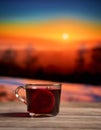 Mulled wine at sunset with snowy mountains Royalty Free Stock Photo