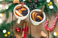 Mulled wine. Traditional Christmas and winter drink with red wine, citrus and spices and Christmas decorations