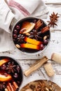 Mulled wine winter drink with spices and cranberries