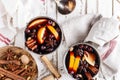 Mulled wine winter drink with spices and cranberries