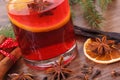 Mulled wine on winter evening with spices and spruce branches Royalty Free Stock Photo