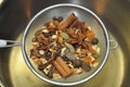 Mulling spices in colander