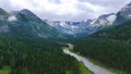 Multa mountain river in Altai, mountains in white clouds, drone view Royalty Free Stock Photo