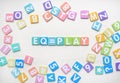 Multi-color Alphabet ABC letters and number and mathematics sign in square flat papers on white background with EQ = PLAY at