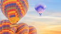 Multi color hot air balloon flying over sunrise sky Royalty Free Stock Photo