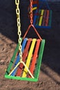 Multi-color painted swing for child on playground