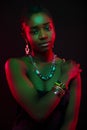 Multi color portrait of confident african woman wearing jewelry Royalty Free Stock Photo