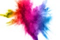 Multi color powder explosion on white background. Royalty Free Stock Photo